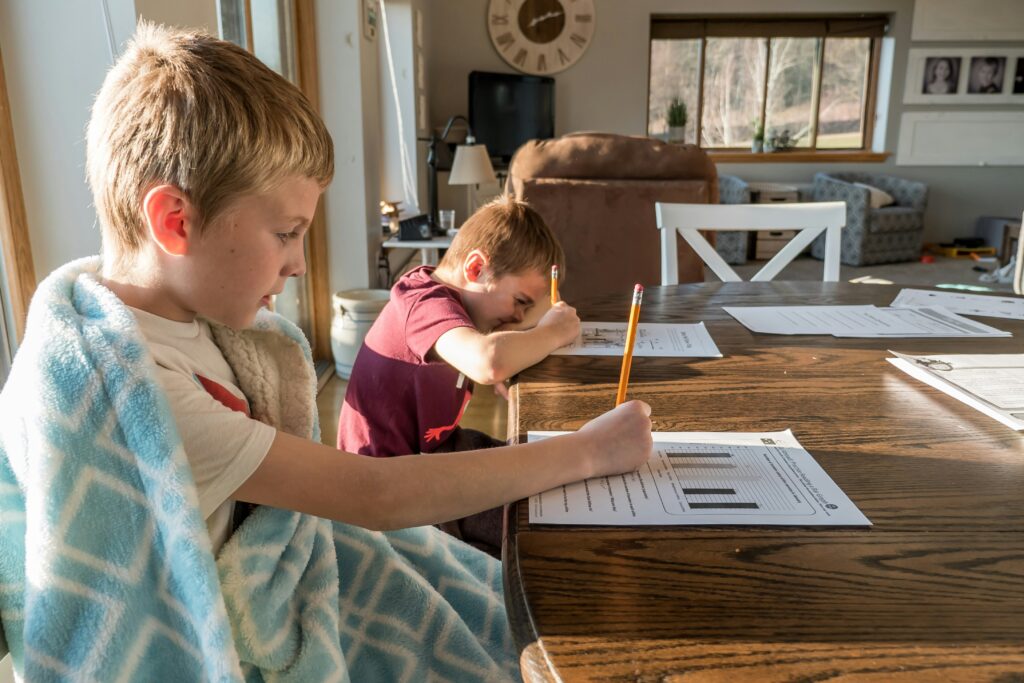 Kids learning at the kitchen table